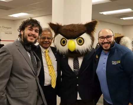 Thomas Arce, Dr. Nagi, and Hootie the Owl