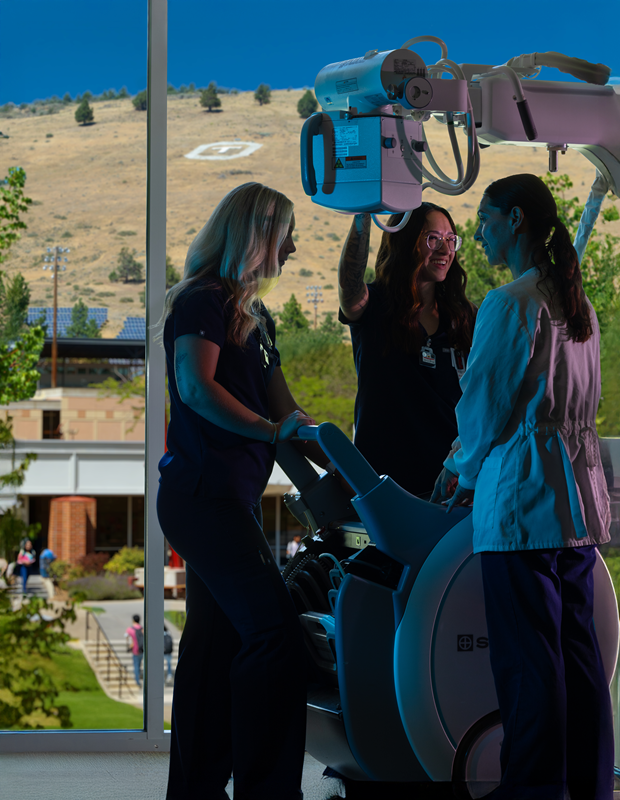 Medical Imaging Students with OT Hill Side Behind Them- 620x800