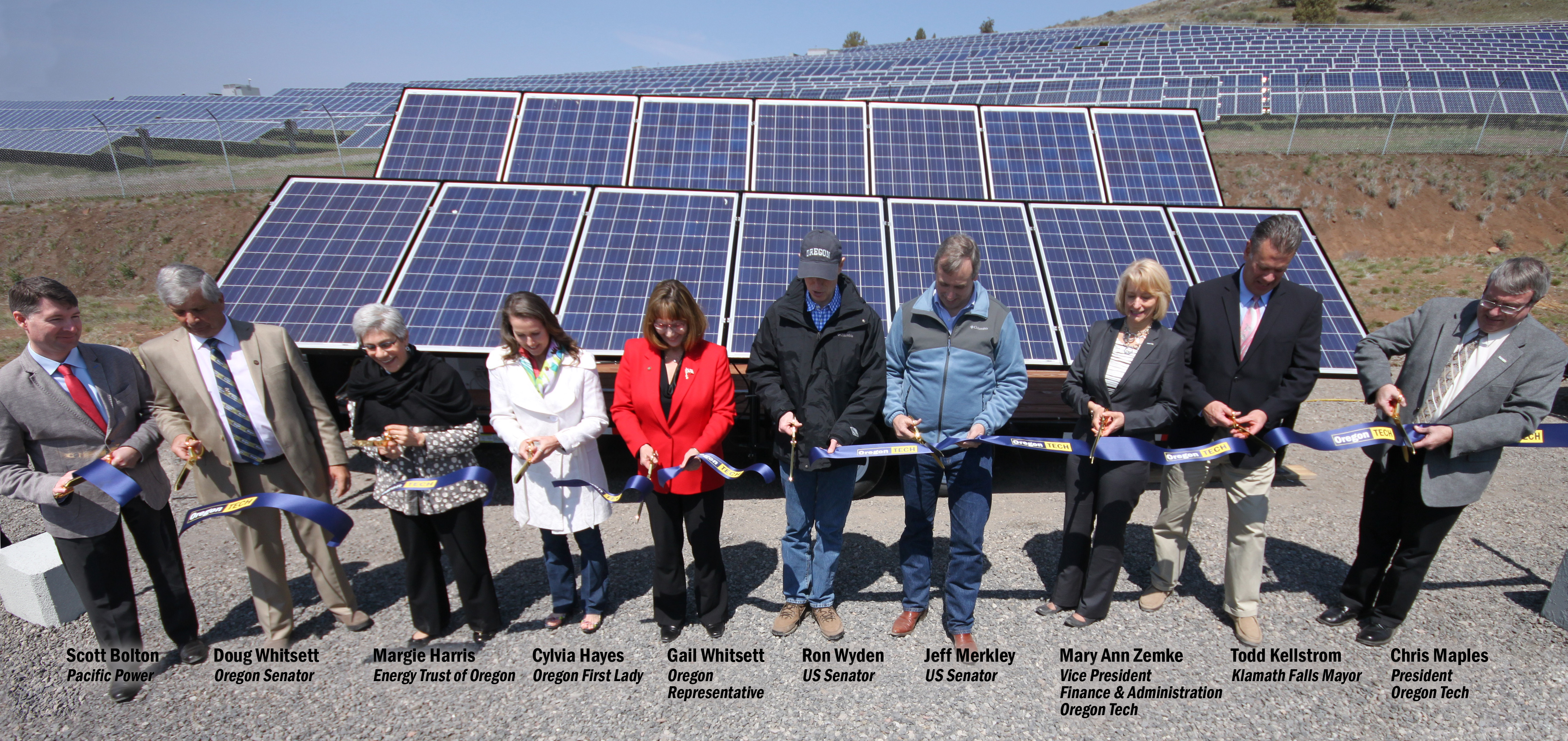 dignitaries at ribbon cutting solar event