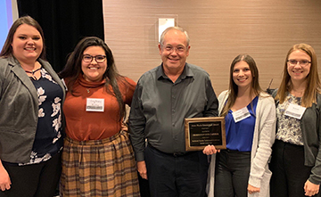 Chris with extern students who were also at the meeting.