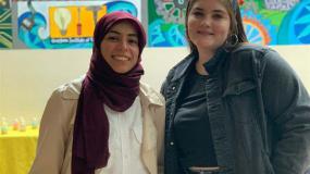 Kawthar Eleanor in front of EERE mural