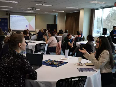 Students discussing a topic at the 2023 Women in STEM Conference