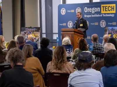 Student Colton Hurst speaking at scholarship banquet