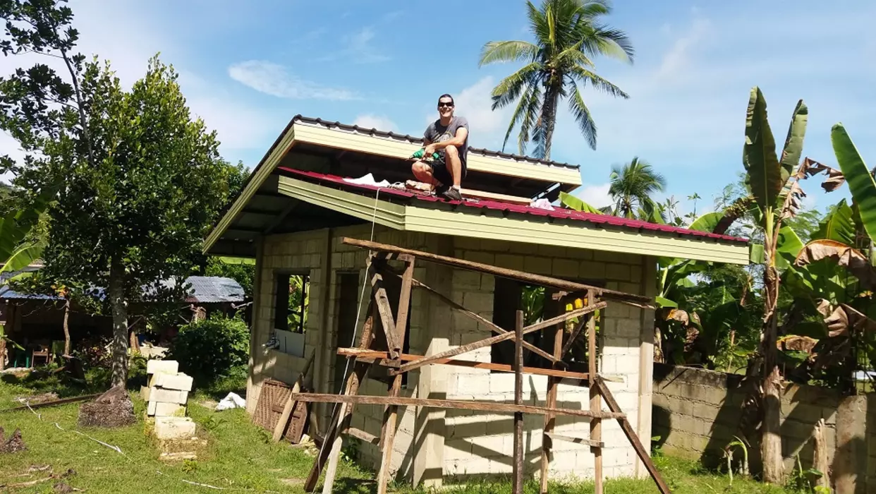 Matthew Tugg installing solar panels in Cebu Philippines