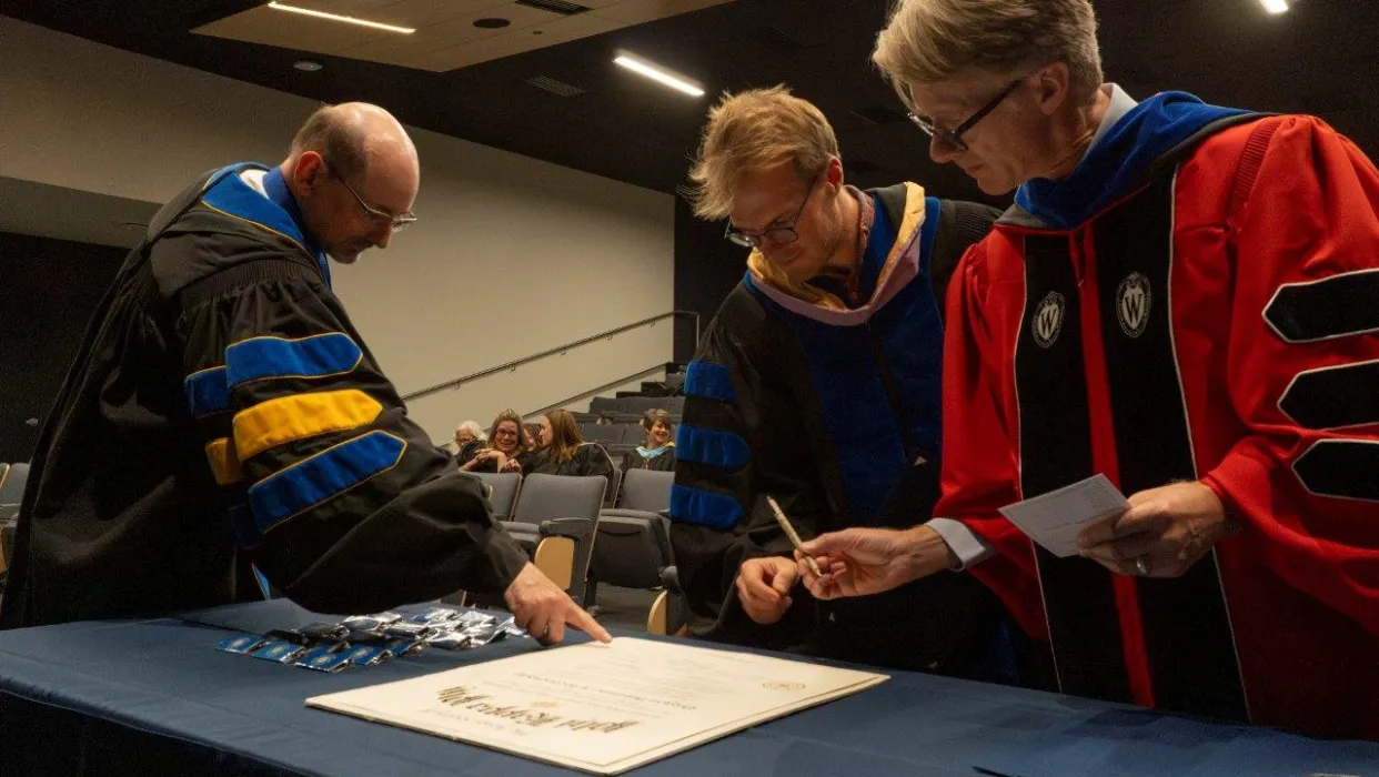 Bradley R. Newcomer, Pake Melland, and Christopher J. Syrnyk at Phi Kappa Phi Installation