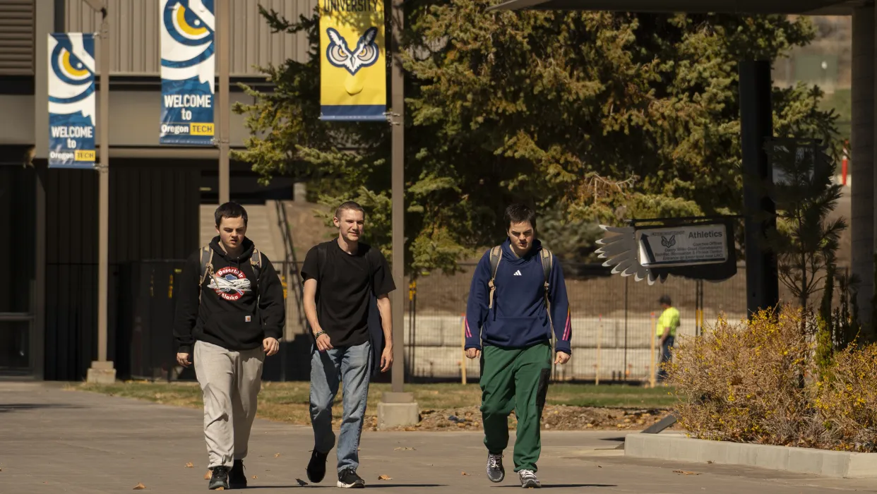 Students Walking Across Campus