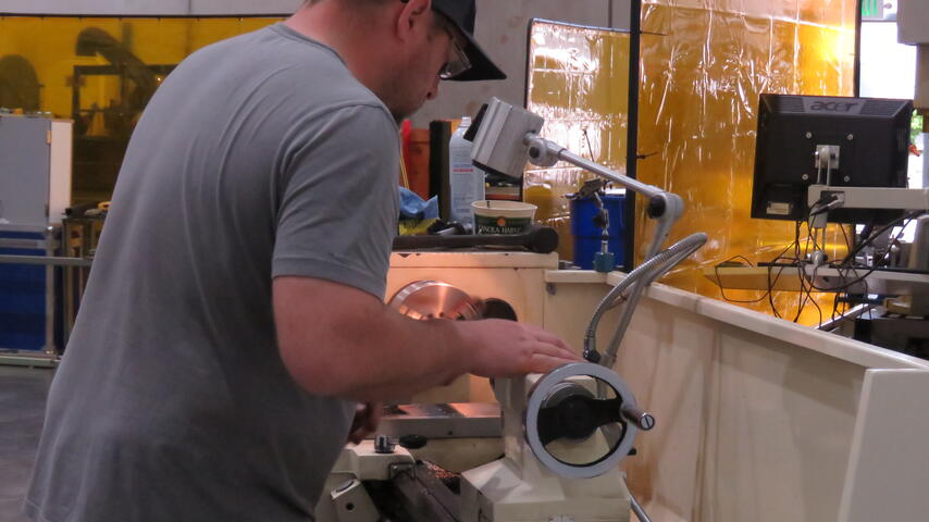 Student working in Canyon Creek facility lab