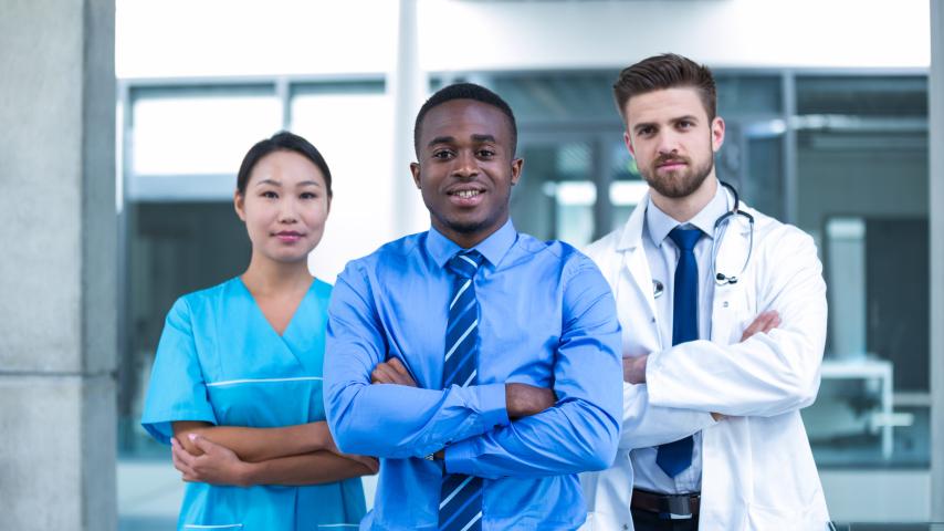 HCM-Blue shirt in front of doctors